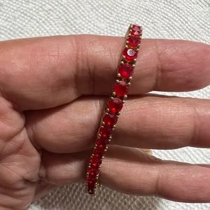 Seta stamped beautiful tennis bracelet gold plated with red crystal